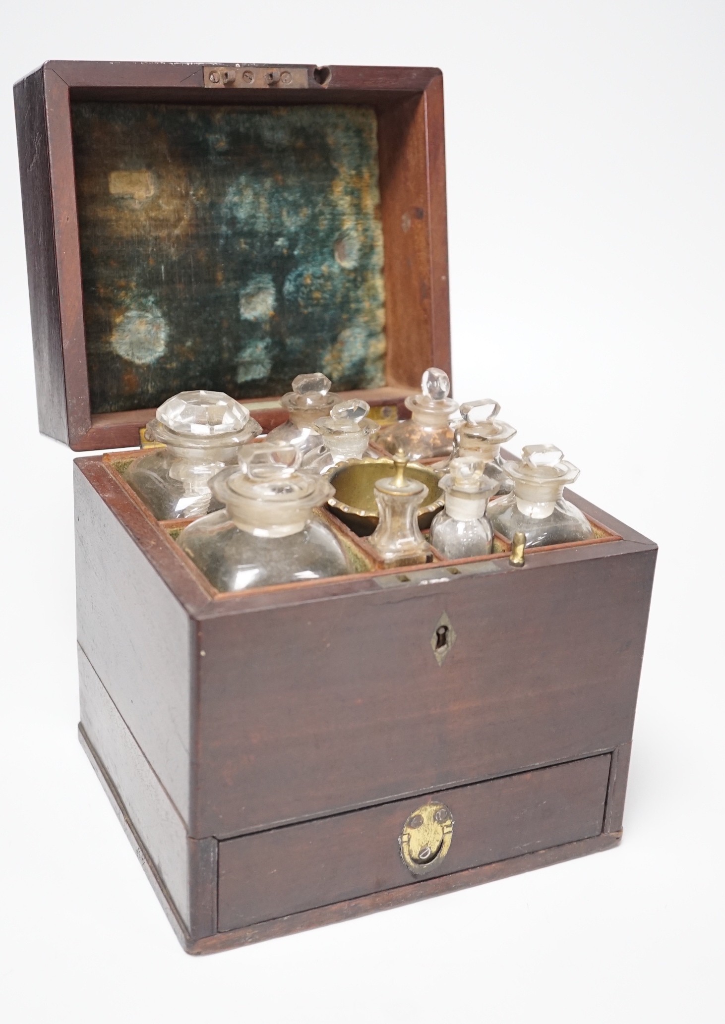 A George III mahogany cased travelling apothecary set with glass flasks, 19cm high